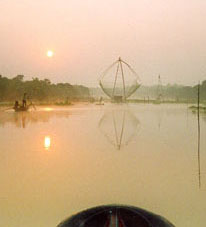 Sunrise with chhnok giant dipnet in Sangke River