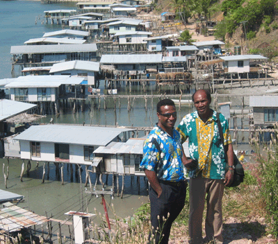 IWP_National_Coordinator,Narua_Lovai(left),_with_Kelly_Madu_above_the_village_of_Barakau.