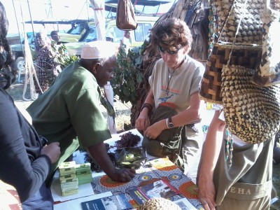 seaweed farmer explaining something to one of the guest at the exihibition in Arusha.jpg